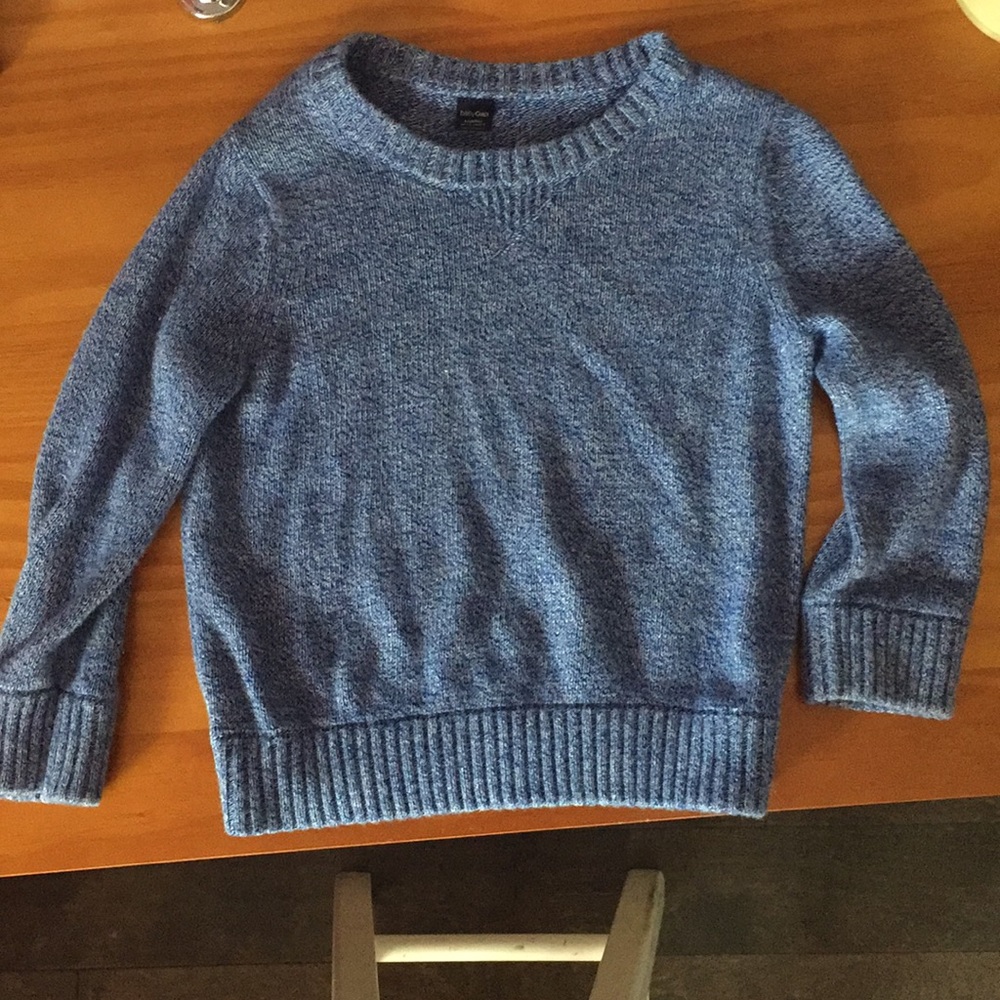 I am asking a  light blue sweater